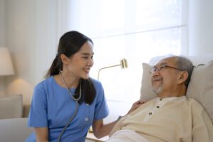Female nurse using a home health care plan