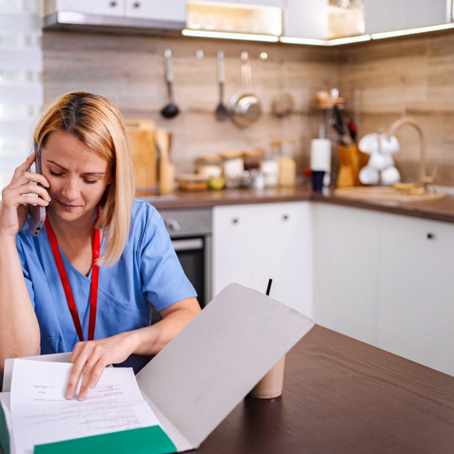 Home health nurse working