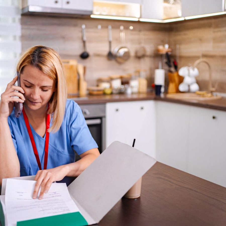 Home health nurse working